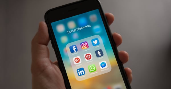 mobile phone displaying social network apps